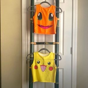 Two Pokémon crop tank tops, Pikachu and Charizard